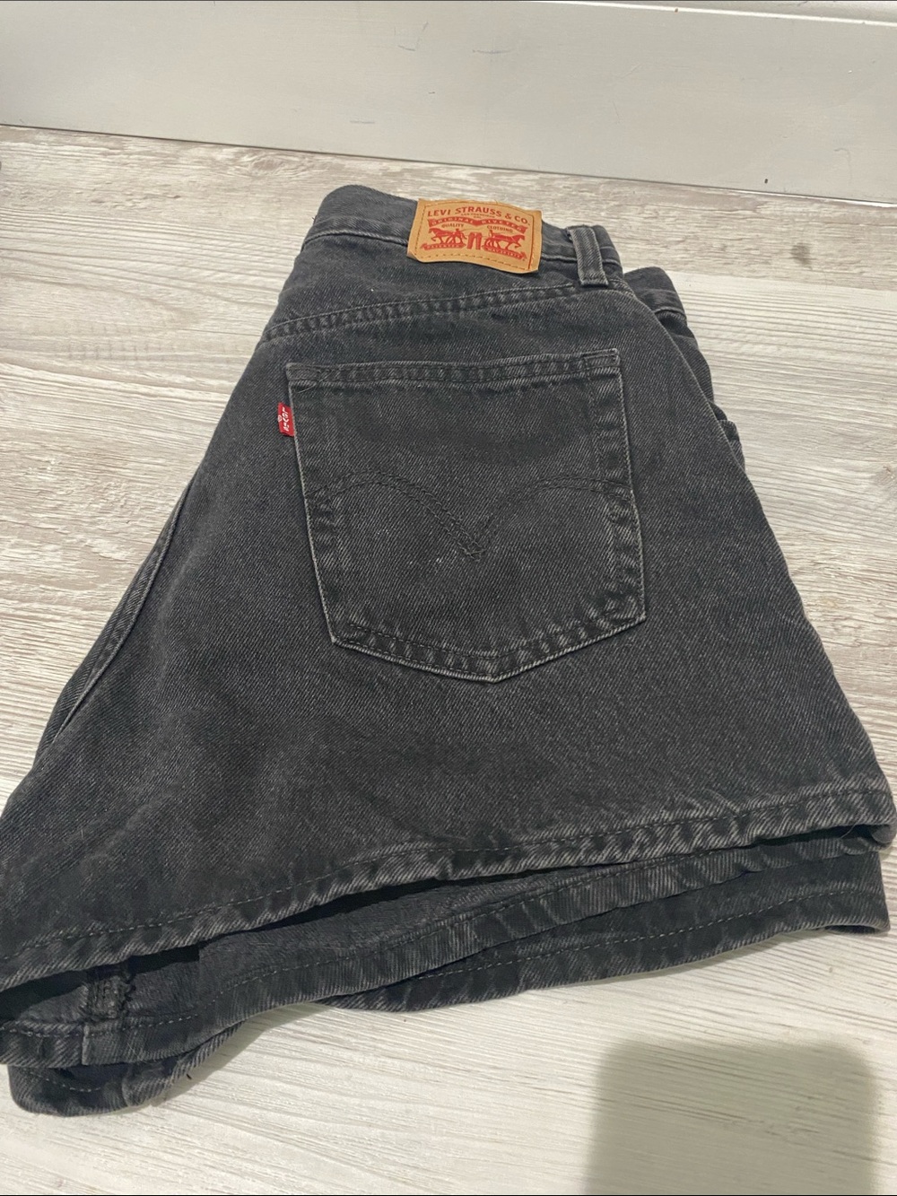 Levi's women’s high rise Washed Black Mom Jean Shorts